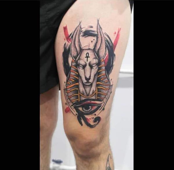 Anubis but only head, completed with some mythology fillers tattoo idea |  TattoosAI