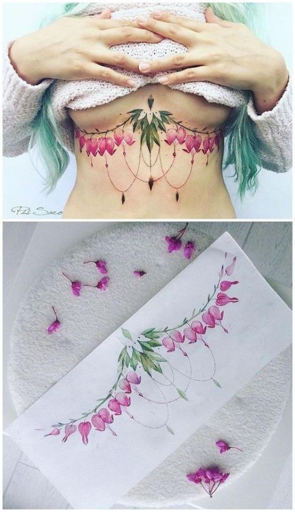 a nice leafy boob tattoo to compliment my sternum piece! done by