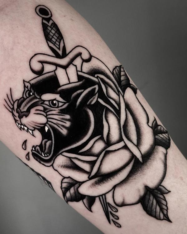Tattoo tagged with: panther, rose, chest | inked-app.com