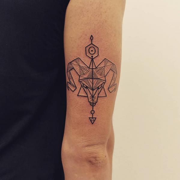 Geometric Aries ram and Sagittarius arrow tattoo