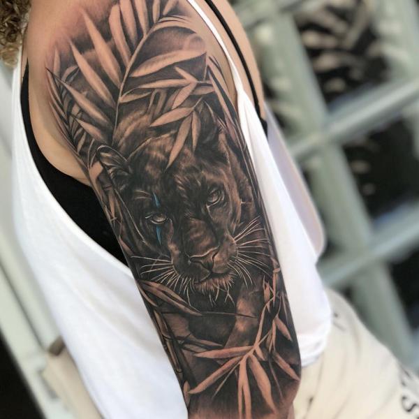 My first tattoo, a traditional panther, done in loving memory of my  grandpa. Savage Ink Tattoo Studio, MI : r/TattooDesigns