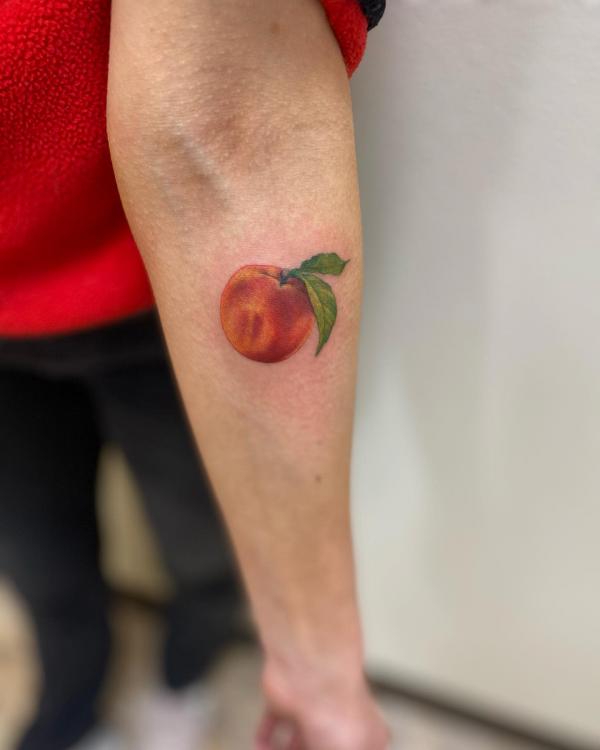 Tattoo uploaded by Tattoodo • Peach tattoo by Joe Spaven #JoeSpaven  #peachtattoos #color #traditional #Japanese #mashup #peach #fruit #food  #leaves #nature #pink #cute • Tattoodo