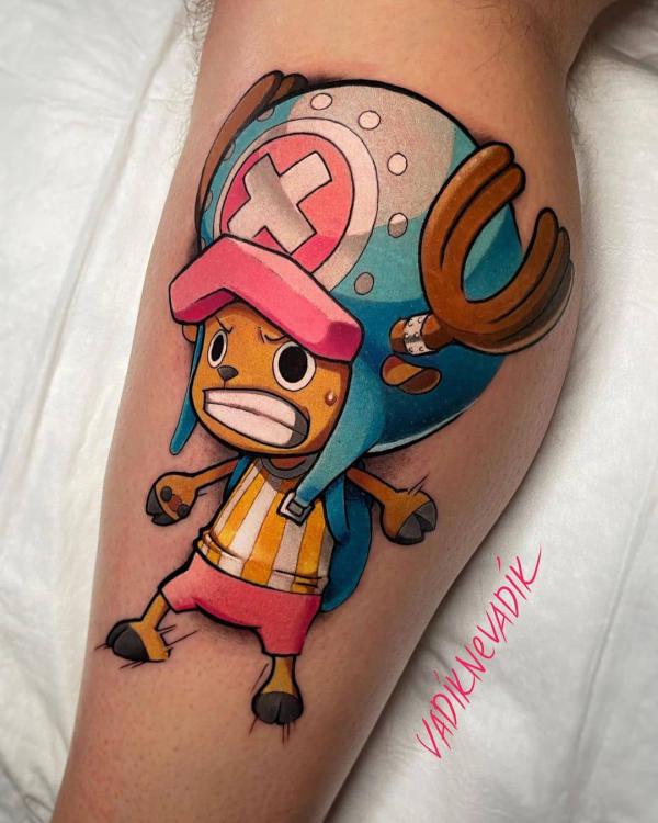 Cute chopper tattoo on calf