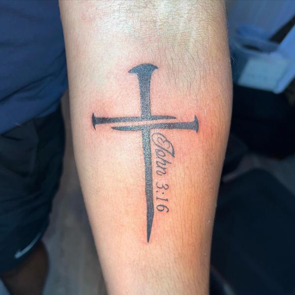 John 3 16 nail cross tattoo forearm