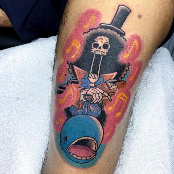 brook one piece tattoo thigh