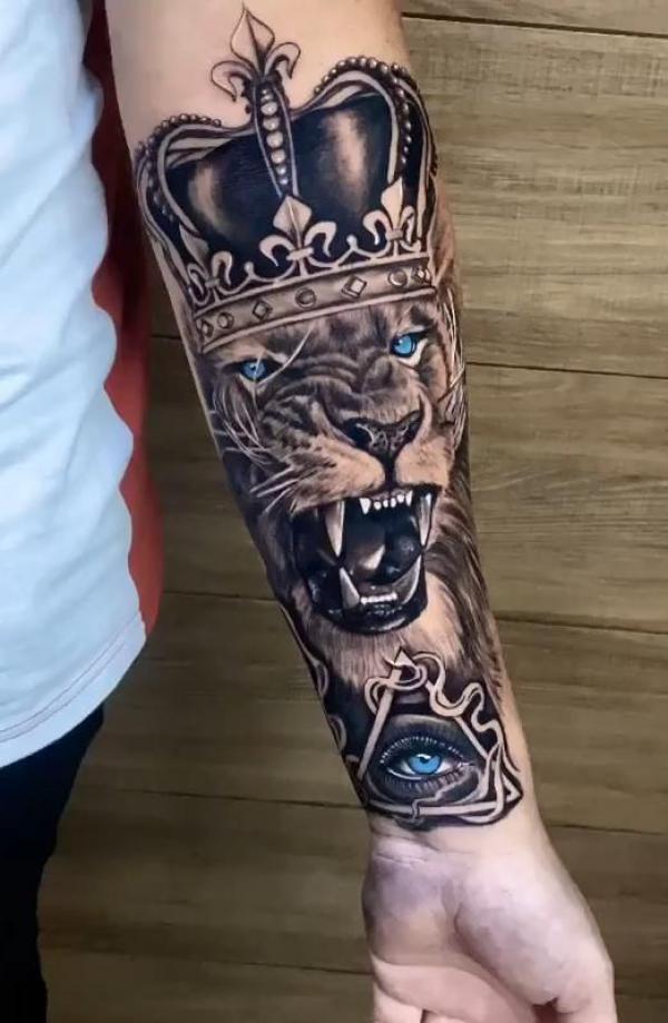 All seeing eye and Lion king tattoo forearm