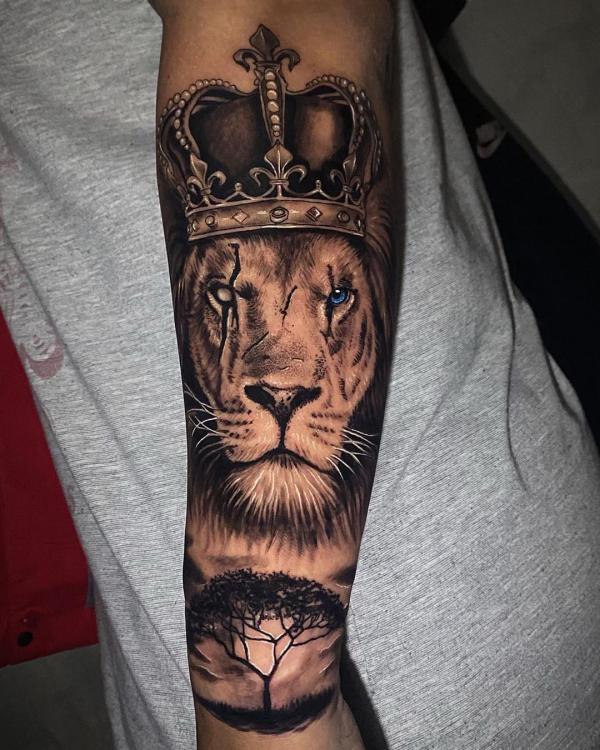 Forearm Lion king with full moon tattoo