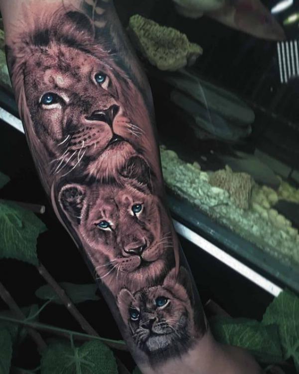 Lion King and two cubs tattoo