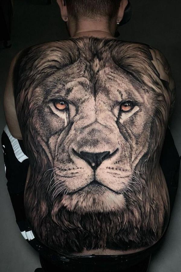 Realistic Lion king head back tattoo