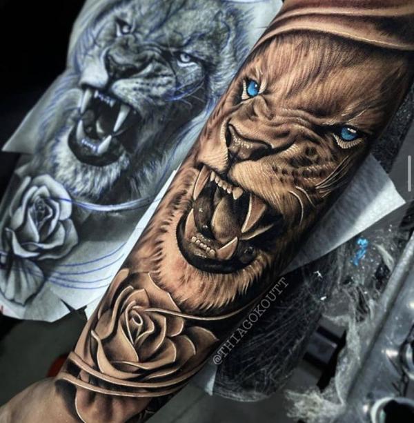 Roaring Lion king and rose tattoo forearm